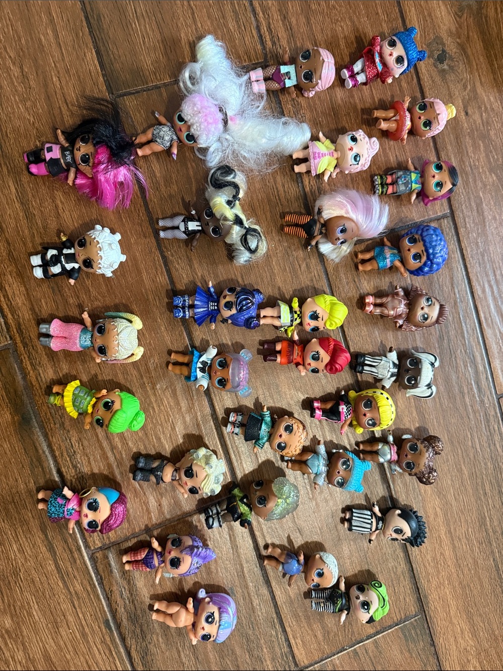 31 L.O.L. Surprise! Mini Dolls Collection with Pink, Purple, Blue, Green and Yel